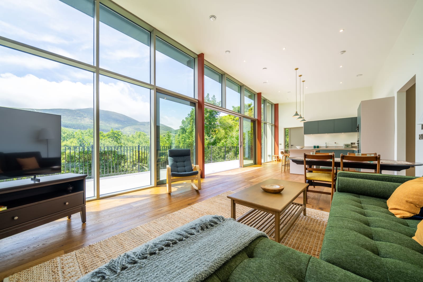 Shan Slieve living room with floor-to-ceiling glazing and a view of the Mournes