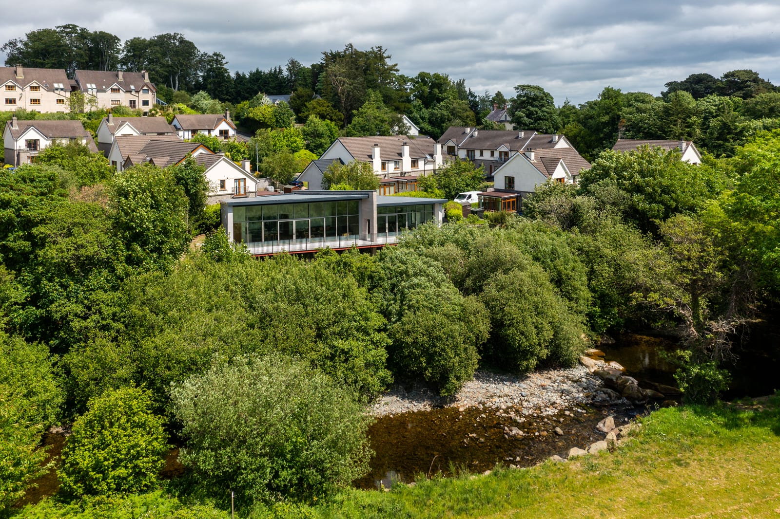 The house seen from above, perched over the Shimna river