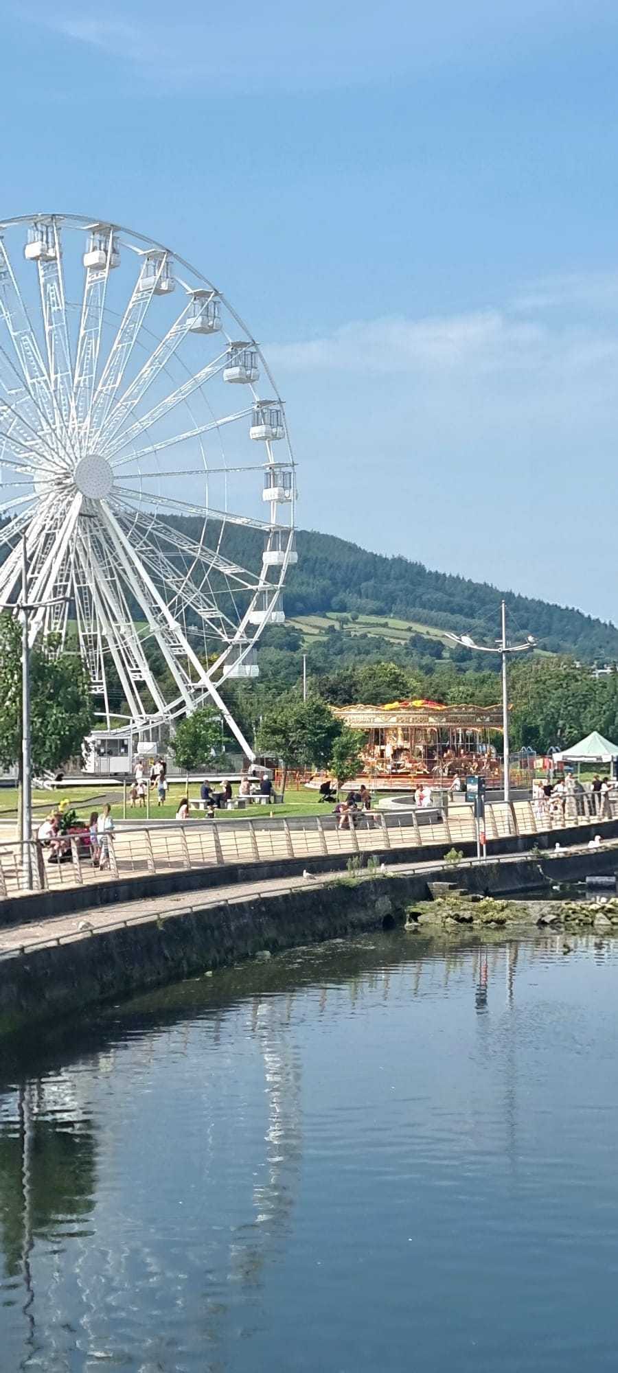 Newcastle waterfront — the ferris wheel, promenade and Mournes beyond